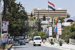 Syrians vote for new parliament amid war, economic turmoil