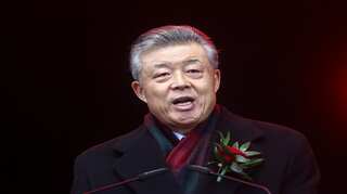 China says it will respond resolutely if UK sanctions officials