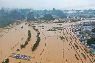 China says more disasters expected as torrential rains continue