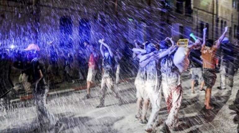 Water cannons fired