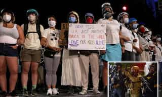 Portland moms form human chain to shield protesters from federal troops