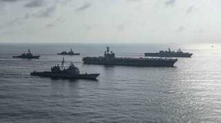 Australian warships 'confronted' by Chinese Navy in disputed South China Sea