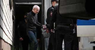 Russian historian who found Stalin-era graves is convicted