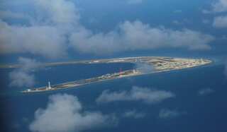 Australia backs US, rejects Beijing's South China Sea claims