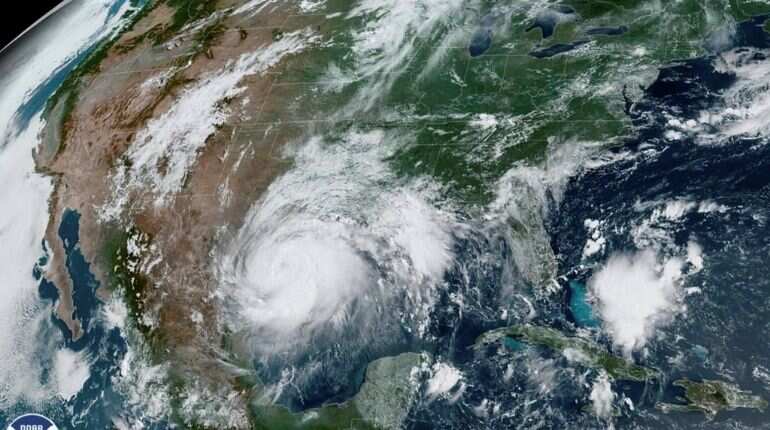 Hurricane Hanna makes landfall on Padre Island, Texas; predicted to trigger flash floods
