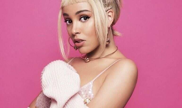 Doja Cat tests Covid-19 positive, pulls out of Jingle Ball tour Doja Cat tests Covid-19 positive, pulls out of Jingle Ball tour