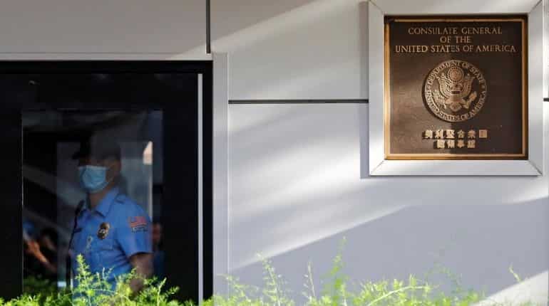 American flag lowered at Chengdu consulate after employees vacate building