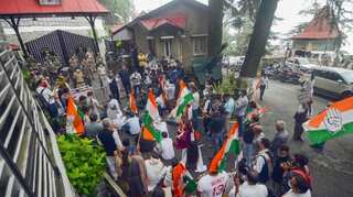 Maintaining social distance, Congress stages protests against BJP