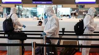 Singapore to make travellers wear electronic tags to enforce quarantine