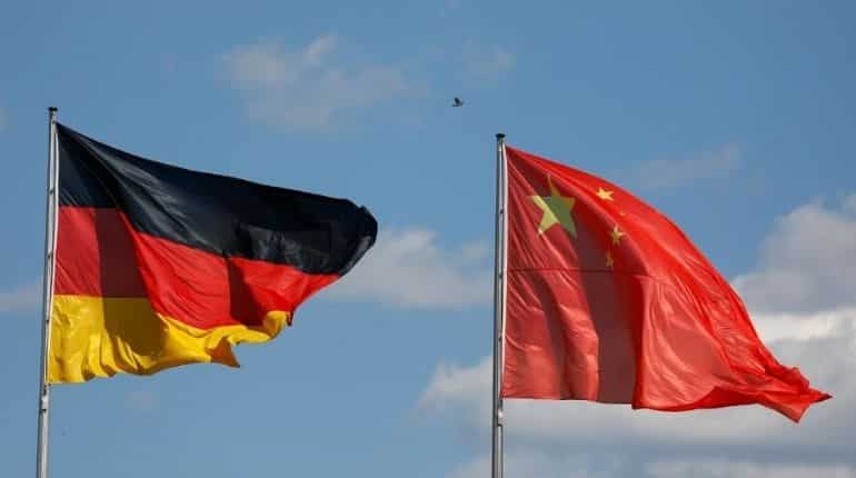 Germany's Merkel bows down to China's economic muscle