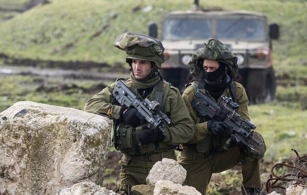 Israel strikes Syrian army bases after Golan heights attack