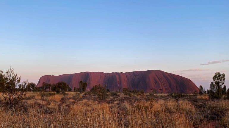 Indigenous Australian group blocks Uluru access route over pandemic fears Indigenous Australian group blocks Uluru access route over pandemic fears
