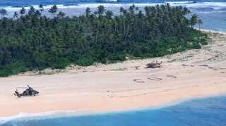 'SOS' on the sand saves lives of three men stranded on a Micronesian island