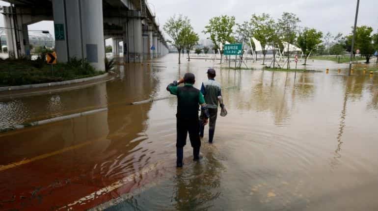 30 people die in South Korea as heavy rain trigger floods and landslides 30 people die in South Korea as heavy rain trigger floods and landslides