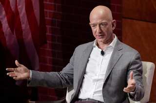 Jeff Bezos' shock exit cools Amazon results boost