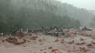 At least 14 killed, 57 missing in landslide as monsoon rains pound Kerala