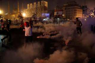 Anger over Beirut blast grows; policeman killed in clashes with protesters