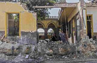 Egypt highway uproots graves, homes in 'City of Dead'