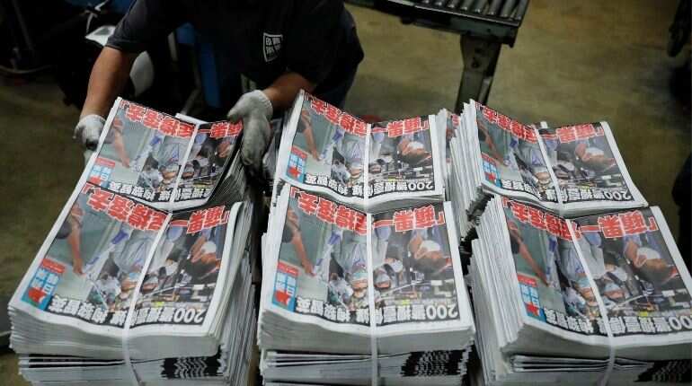 Hong Kong's Apple Daily vows to 'fight on' after owner arrested Hong Kong's Apple Daily vows to 'fight on' after owner arrested