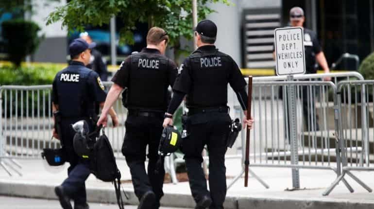 Seattle reduces police funding, signals deeper cuts ahead