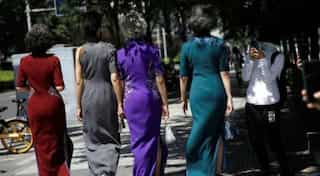 Remove masks, celebrate freedom: Fashion grannies return to Beijing street 'catwalk'