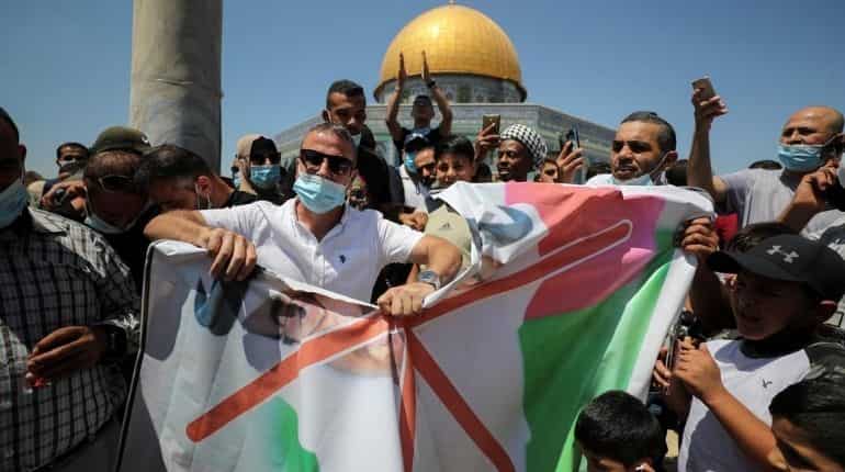 UAE's Israel deal met with Arab dismay but quiet welcome in Gulf