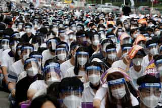 Thousands protest against Moon Jae In as South Korea capital scrambles to curb virus resurgence