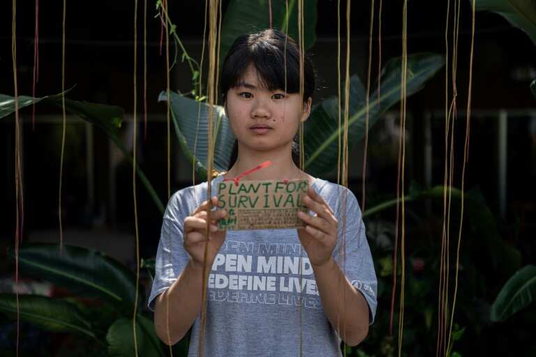 The climate crisis: 17-year-old Chinese climate activist Howey Ou launched a solo march