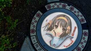 Rubbish problems: Japan city lights up sewer covers, takeaway waste clutters Hong Kong