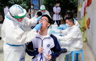 Two Chinese airports now require coronavirus test results to let you travel further