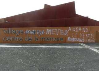 Outrage in France after graffiti denying the Holocaust found at massacre site