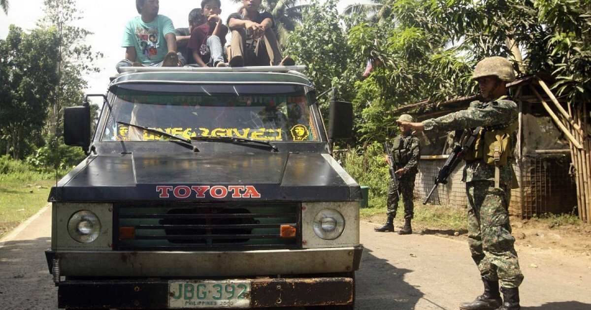 Twin explosions kill at least ten people, wound soldiers in Philippines Twin explosions kill at least ten people, wound soldiers in Philippines
