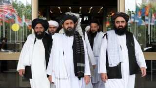 Warring Afghan sides discuss peace talks as deadly blast hits mosque