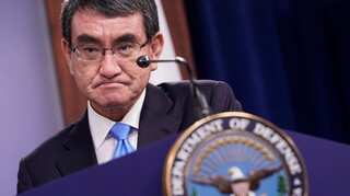 Japan's vaccines minister Kono leads opinion poll on succeeding Suga