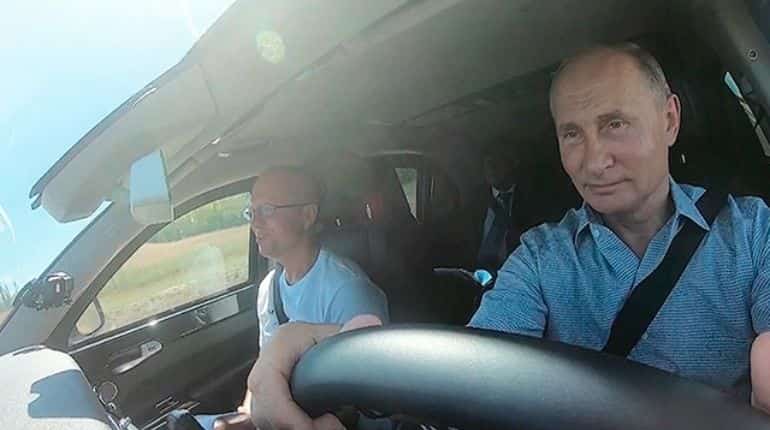 Putin drives car in annexed Crimea during rare trip outside Moscow Putin drives car in annexed Crimea during rare trip outside Moscow