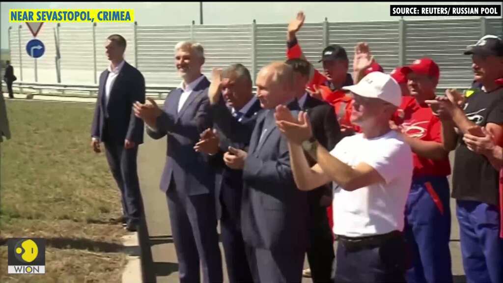 Putin drives car in annexed Crimea during rare trip outside Moscow