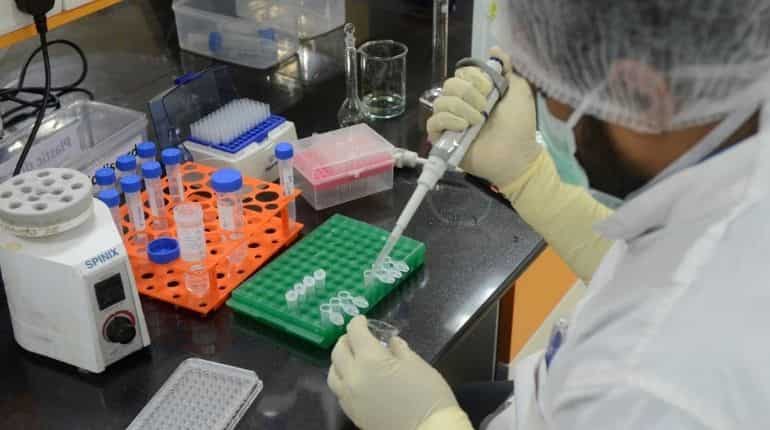 Covid virus expected to continue to transmit for a very long time, says WHO official
