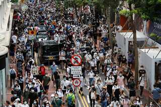 Hong Kong survey shows support grows for pro-democracy goals, 44% back protest movement
