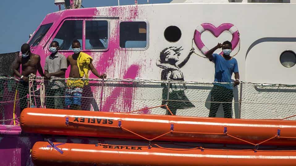 Italian coastguard helps rescue boat funded by Banksy