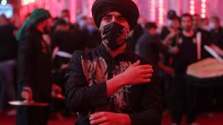 Masks and tears: Shiites mark Ashura in Iraq's Karbala despite coronavirus