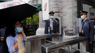 Facial recognition and bathtime bookings: How China's universities are reopening