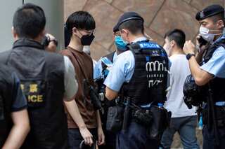 Morning news brief: Hong Kong coronavirus testing row, French President Macron arrives in Lebanon & more