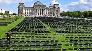 13,000 chairs placed outside German parliament to protest against Greek migrant camps