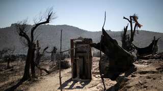 Greek wildfire rages near Athens, residential area evacuated
