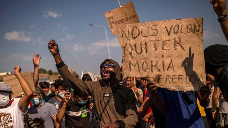 Teargas fired during migrant protests on Greek island of Lesbos
