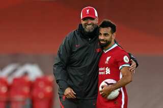 Salah hat-trick saves Liverpool, Arsenal cruise as Premier League returns