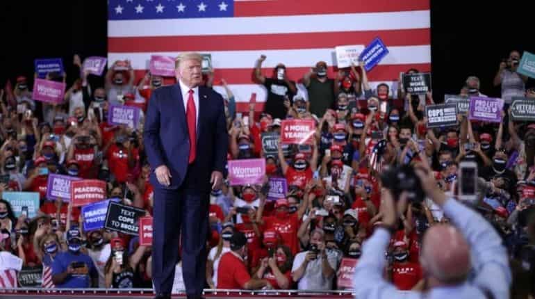 US election 2020: Trump defies COVID-19 norms in first indoor rally since June, prompts warning