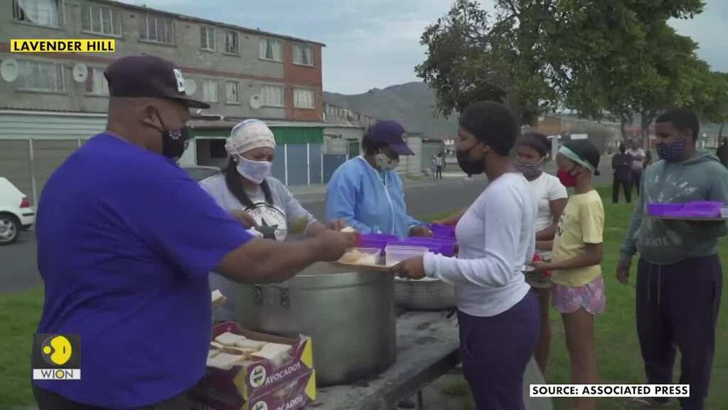 South Africa volunteers help feed homeless and children