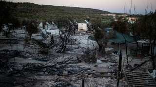 Thirteen migrants detained after second fire breaks out in Greek migrant camp