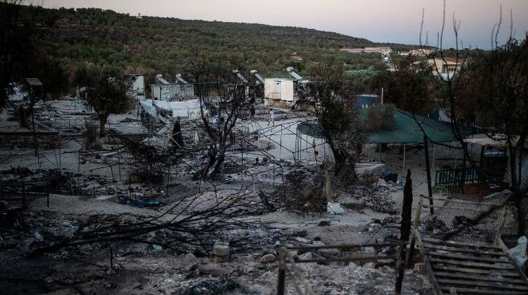 Four Afghans get 10-year jail terms for Greek migrant camp fire
